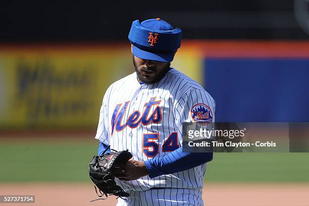 Pitcher Alex Torres, New York Mets, wearing protective head gear while pitching during the New York Mets Vs Miami Marlins MLB regular season baseball...