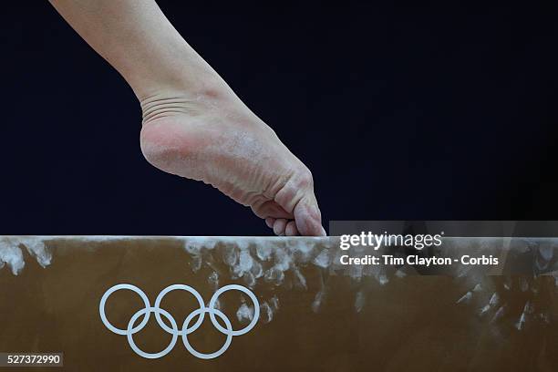 Study of gymnasts feet on the balance beam. One of the most challenging disciplines of the Olympic games sees young gymnasts performing amazing...