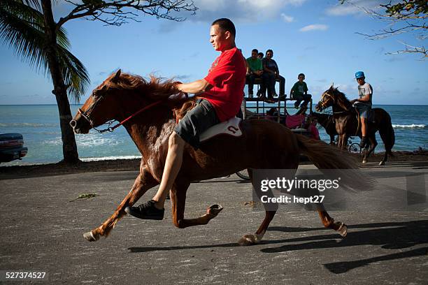 celebrating dia de descubrimiento on horseback - descubrimiento stock pictures, royalty-free photos & images