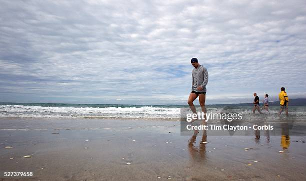 Quade Cooper walks on the foreshore during the Australian teams recovery session at Takapuna Beach at the IRB Rugby World Cup tournament, Auckland,...