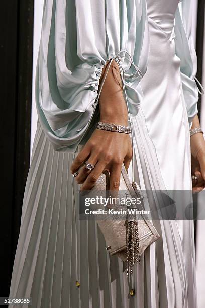 Close up of actress Jennifer Lopez ring, jewelry and hand bag as she arrives at New Line Cinema's Premiere of "Monster In Law" at the Mann National...