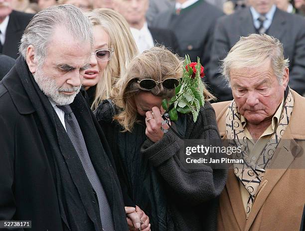 Maria Schell's brothers Maximilian Schell , Carl Schell and her daughter Marie Theres Kroetz-Relin attend the funeral of actress Maria Schell at the...