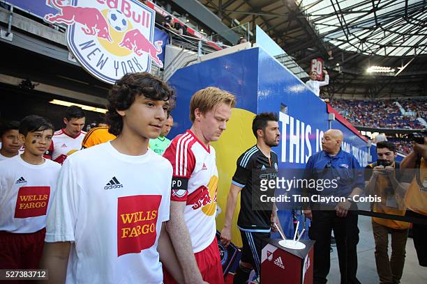 Dax McCarty, , New York Red Bulls and David Villa, NYVFC, lead their teams out during the New York Red Bulls Vs NYCFC, MLS regular season match at...