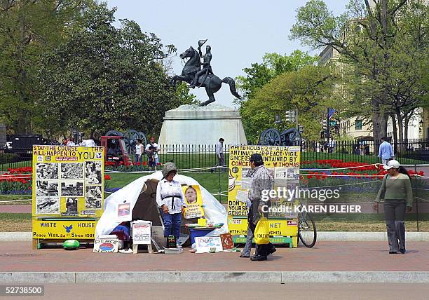 Activist Concepcion Picciotto greets visitors to her stand across from the White House 19 April in Washington, DC. Picciotto has continued a vigil...