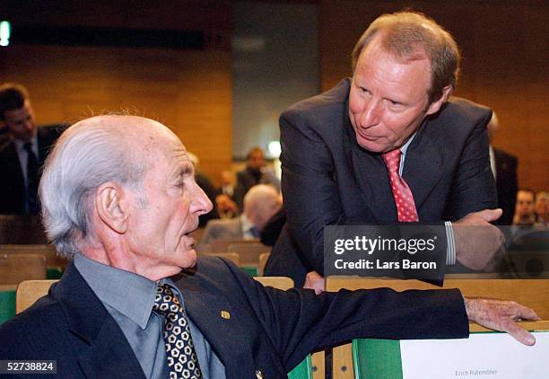 Dettmar Cramer talks to Berti Vogts during the 50th annual Football Teacher Seminar at the German Academy of Sport on April 27, 2005 in Cologne,...