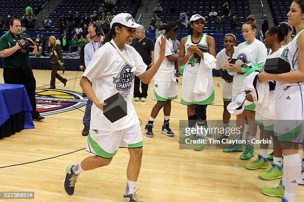 Skylar Diggins, Notre Dame, returns to the team with her winners gift after the Connecticut V Notre Dame Final match won by Notre Dame 61-59 during...