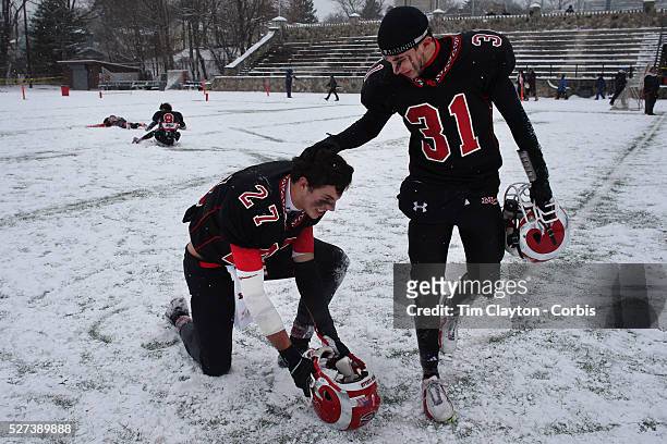 Sterling Guynn, , New Canaan, celebrates with team mate Michael DiCosmo after victory during the New Canaan Rams Vs Darien Blue Wave, CIAC Football...