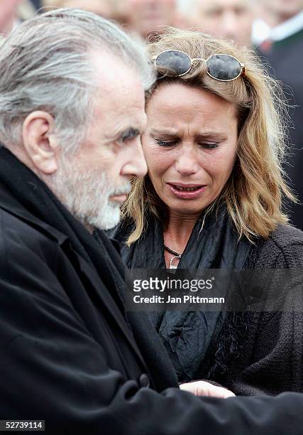 Maria Schell's brother Maximilian Schell, left, and her daughter Marie Theres Kroetz-Relin, right, attend the funeral of actress Maria Schell at the...