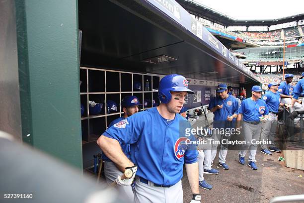 Mike Baxter, Chicago Cubs, in the dugout preparing to bat during the New York Mets Vs Chicago Cubs MLB regular season baseball game at Citi Field,...