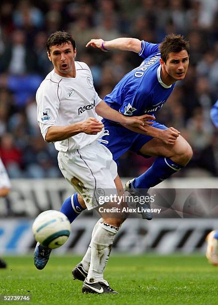 Frank Lampard of Chelsea beats Gary Speed of Bolton Wanderers during the Barclays Premiership match between Bolton Wanderers and Chelsea at the...