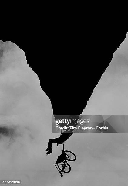 Wheelchair Rock climber Nick Morozoff hangs from a rock face in Sydney Australia. Nick was a keen rock climber before becoming a paraplegic after a...