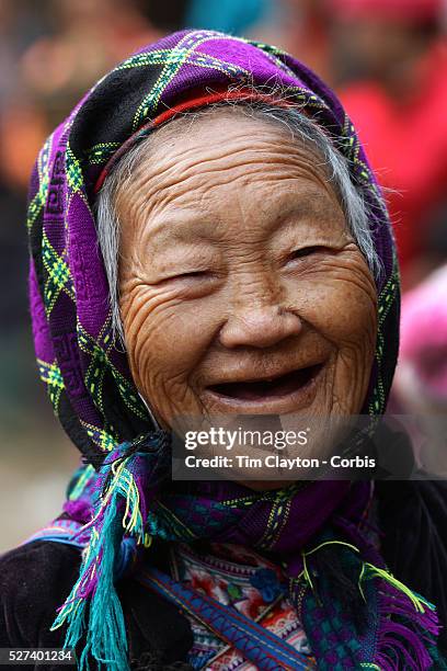 Ae elderly lady at the Lung Khau Nhin Market. Vietnam. Lung Khau Nhin Market is rural tribal market hiding itself amongst the mountains and forests...