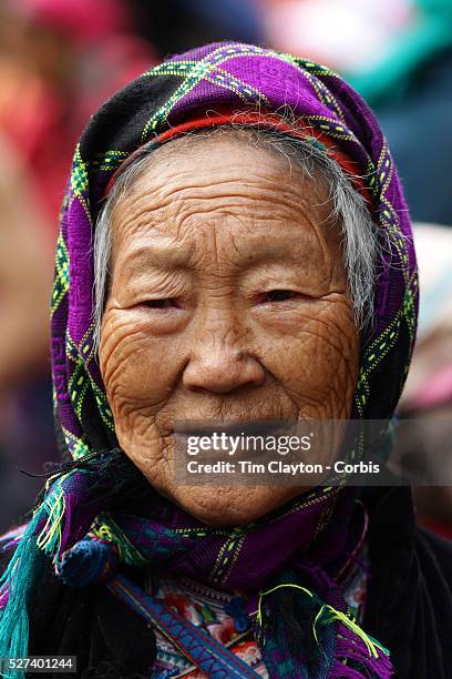 Ae elderly lady at the Lung Khau Nhin Market. Vietnam. Lung Khau Nhin Market is rural tribal market hiding itself amongst the mountains and forests...