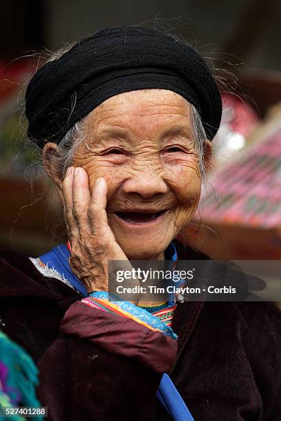 Ae elderly lady at the Lung Khau Nhin Market. Vietnam. Lung Khau Nhin Market is rural tribal market hiding itself amongst the mountains and forests...