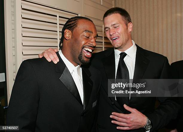 Quarterbacks Donovan McNabb and Tom Brady, whose teams met in the most recent Superbowl, share a laugh at the White House Correspondents dinner at...