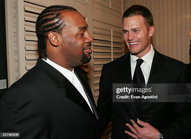 Quarterbacks Donovan McNabb and Tom Brady, whose teams met in the most recent Superbowl, attend the White House Correspondents dinner at the...