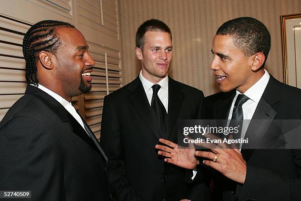 Quarterbacks Donovan McNabb and Tom Brady , whose teams met in the most recent Superbowl, chat with the U.S. Senator Barack Obama at the White House...