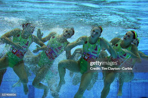 The team from Australia competes during the Synchronized Swimming team technical routine at the Aquatics Centre, Olympic Park, during the London 2012...