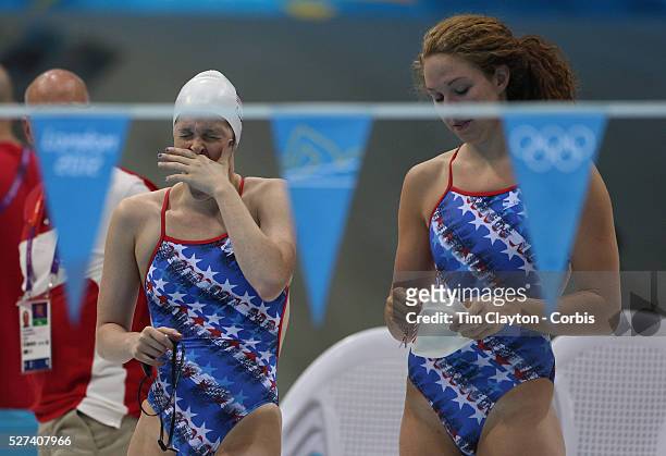 Swimmers Cammile Adams, and Shannon Vreeland find yawning is contagious before training at the Aquatic Centre at Olympic Park, Stratford during the...