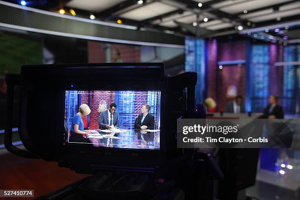 Sports Network presenters Rebecca Lowe, Robbie Earle, and Robbie Mustoe, , at work in the NBC Sports Network studios in Stamford, Connecticut, during...