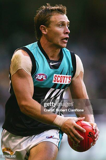 Michael Wilson of Port Adelaide in action during the AFL round 6 match between the Richmond Tigers and the Port Adelaide Power at the Telstra Dome on...