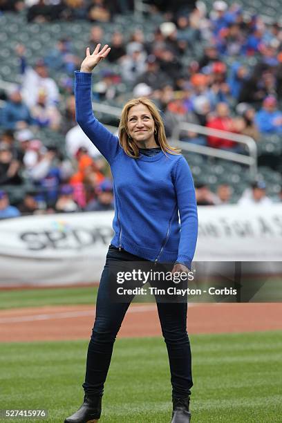'Nurse Jackie' Star Edie Falco throws out the first pitch before the New York Mets Vs Atlanta Braves MLB regular season baseball game at Citi Field,...