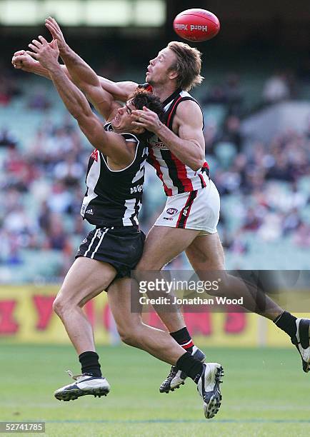 Chris Tarrant of Collingwood and Max Hudghton of St Kilda during the AFL match between Collingwood and St Kilda at the MCG on May 1, 2005 in...