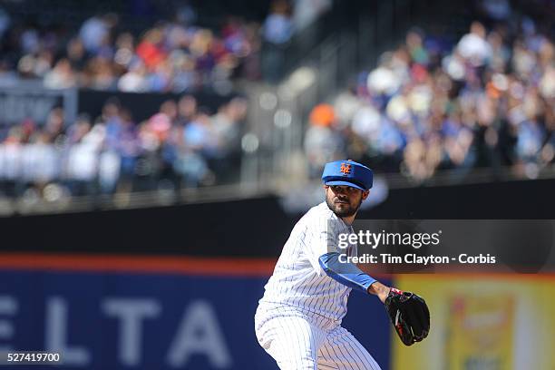 Pitcher Alex Torres, New York Mets, wearing protective head gear while pitching during the New York Mets Vs Miami Marlins MLB regular season baseball...