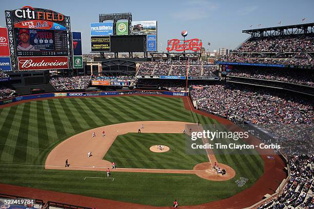 Pitcher Alex Torres, New York Mets, pitching with bases loaded during the New York Mets Vs Washington Nationals MLB regular season baseball game at...