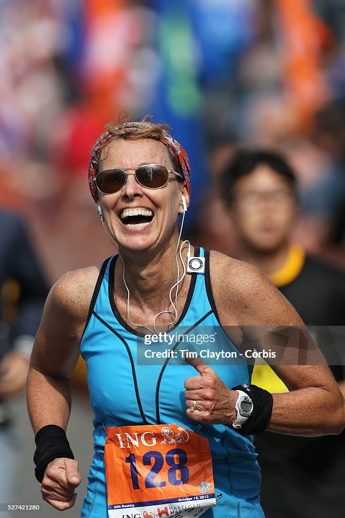The Finish Line. Expressions of athletes as they complete the ING Hartford Marathon and Half Maratho