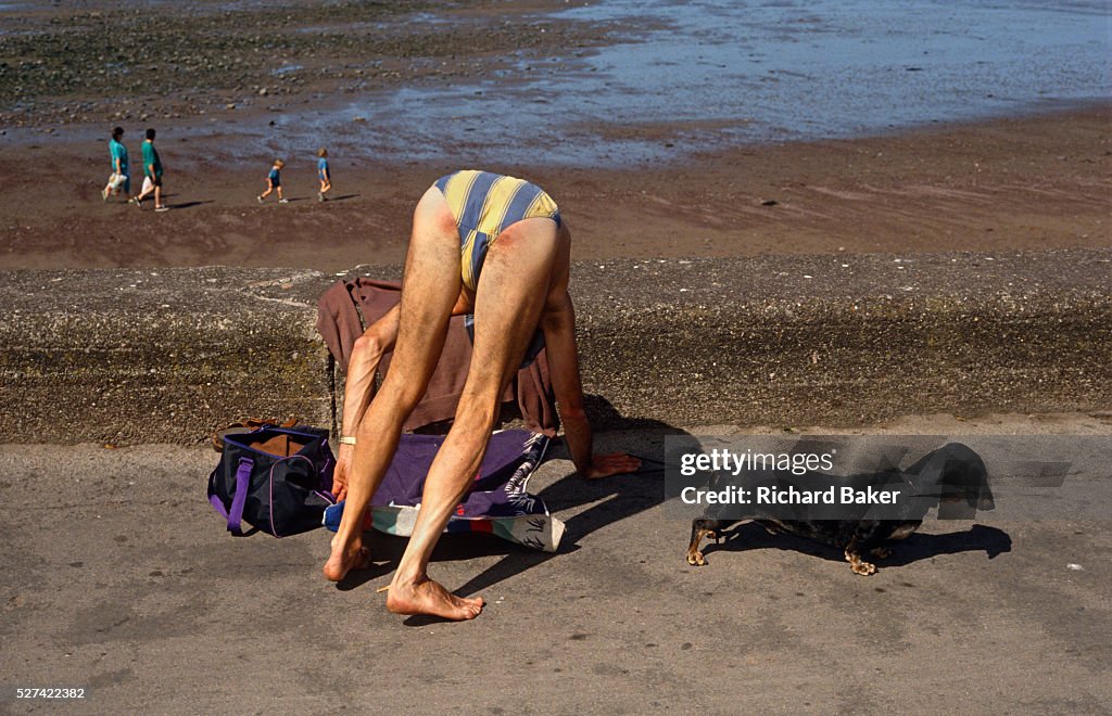 England - Somerset - Seafront Bather and Pet Dog