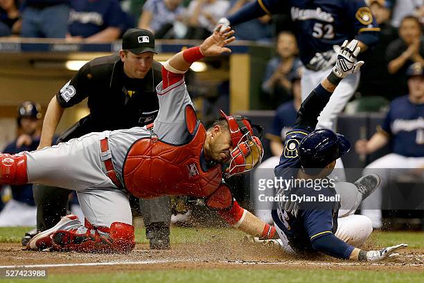 Ryan Braun of the Milwaukee Brewers slides safely into home past Geovany Soto of the Los Angeles Angels of Anaheim in the fifth inning at Miller Park...