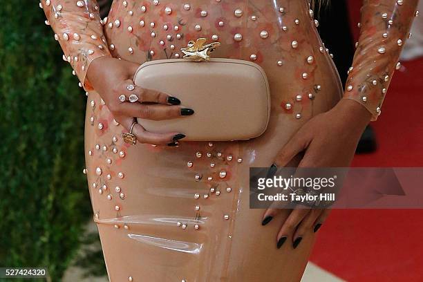 Beyonce Knowles, clutch detail, ring detail, attends "Manus x Machina: Fashion in an Age of Technology", the 2016 Costume Institute Gala at the...