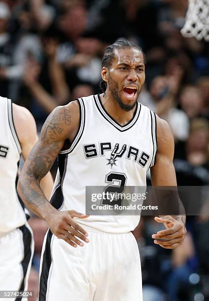 Kawhi Leonard of the San Antonio Spurs reacts after a defensive stop against the Oklahoma City Thunder during game Two of the Western Conference...