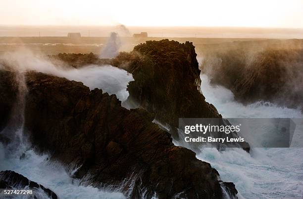 West of the island receiving the full force of the Atlantic with 11 meter waves hitting the 100ft cliffs behind West Town. Tory Island - nine miles...