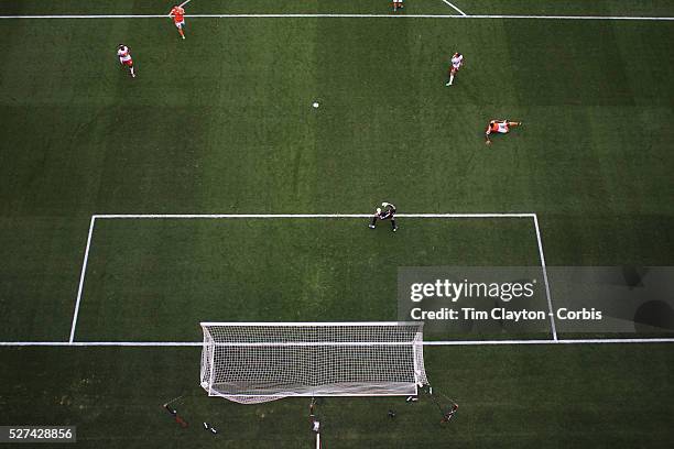 Jonathan Steele, , New York Red Bulls, beats Houston goalkeeper Tally Hall to score the Red Bulls second goal during the New York Red Bulls V Houston...