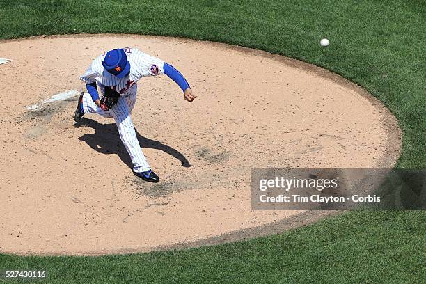 Pitcher Alex Torres, pitching in protective head gear during the New York Mets Vs Washington Nationals MLB regular season baseball game at Citi...