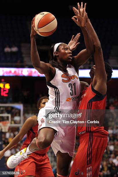 Tina Charles, Connecticut Sun, drives to the basket during the Connecticut Sun V Washington Mystics WNBA regular season game at Mohegan Sun Arena,...