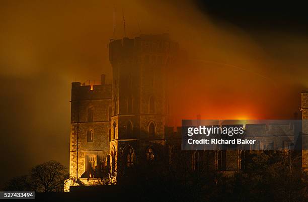 Flames lick the roof of the Queen's private and state apartments in Windsor Castle as smoke darkens further the night sky. We see the most northerly...