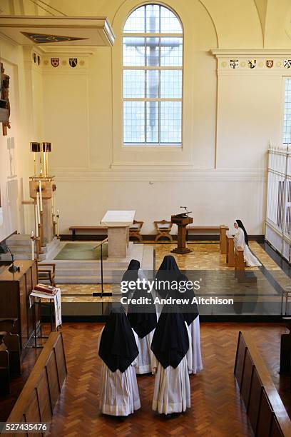 Sisters go to pray at the crypt in the Tyburn Convent on Bayswater Rd, London.