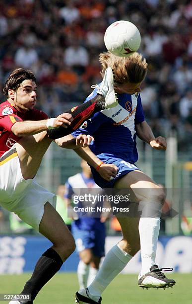 Simone Perrotta of Roma and Marius Stankevicius of Brescia in action during the Serie A match between AS Roma and Brescia at the Stadio Olimpico on...