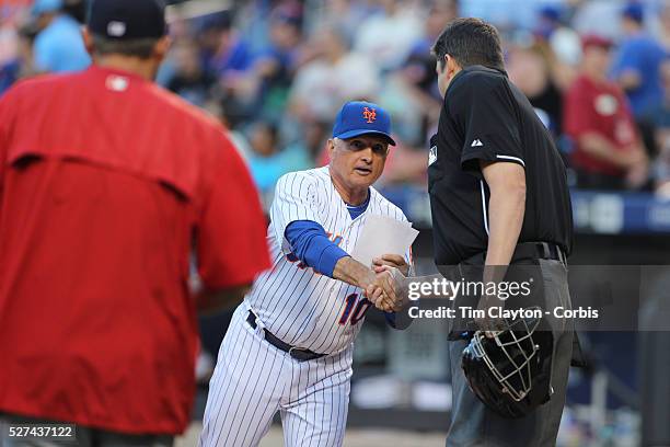 Terry Collins New York Mets Manager, exchenages batting line ups at home plate before the New York Mets Vs Washington Nationals. MLB regular season...