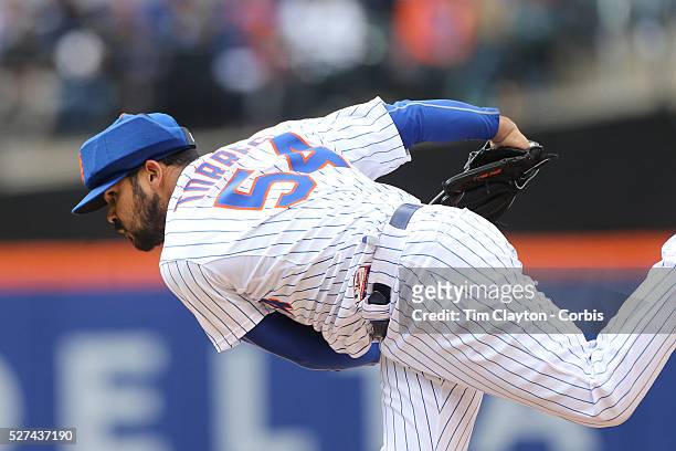 Pitcher Alex Torres, New York Mets, pitching with protective head gear during the New York Mets Vs Atlanta Braves MLB regular season baseball game at...