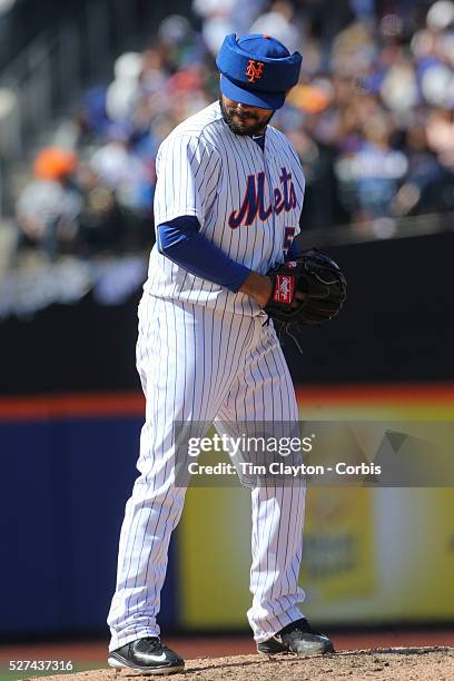 Pitcher Alex Torres, New York Mets, wearing protective head gear while pitching during the New York Mets Vs Miami Marlins MLB regular season baseball...