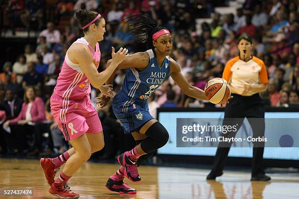 Monica Wright, , Minnesota Lynx, drives past Kelly Faris, Connecticut Sun, during the Connecticut Sun Vs Minnesota Lynx, WNBA regular season game at...