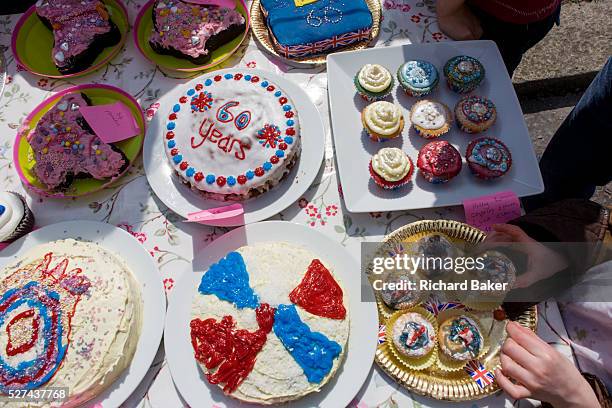 Home-made cakes compete in a competition at a neighbourhood street party in Herne Hill, south London celebrating the Diamond Jubilee of Queen...