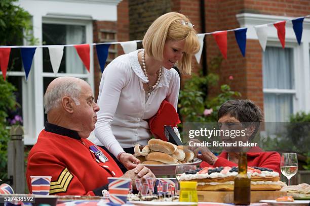 Serving the elderly at a community street party in Dulwich, south London celebrating the Diamond Jubilee of Queen Elizabeth. A few months before the...