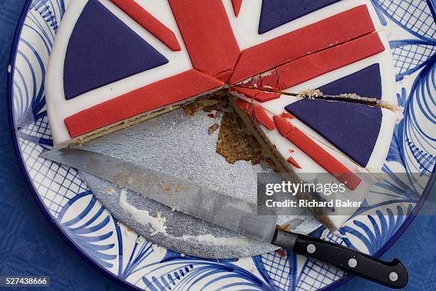 Sliced Union Jack cake at a neighbourhood street party in Dulwich, south London celebrating the Diamond Jubilee of Queen Elizabeth. A few months...