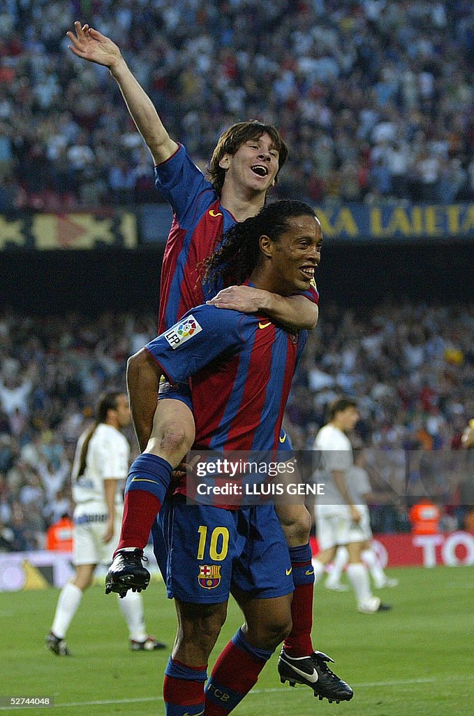 FC Barcelona's Argentinian Messi (up) an