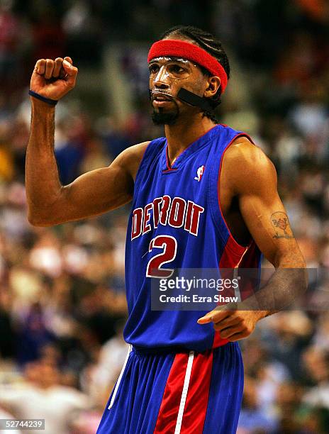 Richard Hamilton of the Detroit Pistons pumps his fist after his teammate Chauncey Billups made a 3-pointer to give the Pistons a 83-82 lead in the...